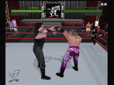 L'Undertaker tord le bras d'Edge