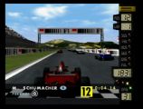 Départ d'une course dans le jeu F1 World Grand Prix. On est loin de la pole position mais le talent de Michael fera le job !