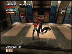 Smasher vient de se prendre un pain dans Fighting Force 64 sur Nintendo 64, mais il bronche a peine et va se venger à coups de matraque sur Junior ! (Fighting Force 64)
