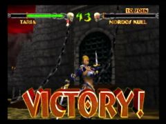 Ecran de victoire de Taria qui se la joue dans le jeu Mace the dark age sur Nintendo 64 (Mace: The Dark Age)