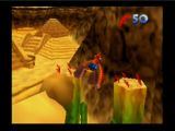 Banjo et Kazooie en phase de vol grâce aux plumes rouges dans le niveau désert de Gobi