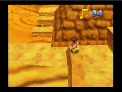 Some musical notes around a pyramid in the Gobi desert level  (Banjo-Kazooie)