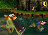 Official screenshot of the game. Banjo is chased not far from his home in the perched mountain 