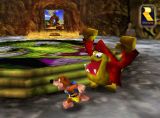 Official screenshot of the game. Banjo is chased by a minion of Gruntilda in her lair. 