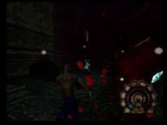 Combat sanglant dans la cathédrale de la douleur, lieu phare du jeu Shadow Man sur Nintendo 64. (Shadow Man)