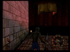 Dans Shadow Man sur Nintendo 64, Mike peut tenir deux armes en même temps. Ici, il est équipé du bâton et de l'Asson (Shadow Man)