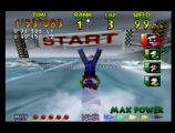 Miles Jeter fait le poirier pour célébrer sa victoire à la course Marine Fortress du jeu Wave Race 64 sur Nintendo 64. Move on to the next round !