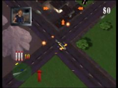 À l'aide des missiles de la moto Ballista, détruisez les bâtiments entourés de flèches pour libérer le passage (Blast Corps)