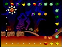 Yoshi avance avec prudence dans le niveau Soupe de Blargg du jeu Yoshi's Story sur Nintendo 64 (Yoshi's Story)