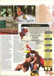 Scan du test de Banjo-Kazooie paru dans le magazine X64 10, page 14